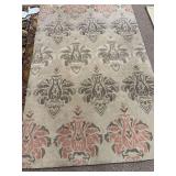 5 x 8 rug tan, green and peach colors