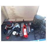 Spot light, taps measurers, box cutter. lighter, misc