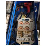 Contents of drawer in blue cabinet, dual temp heat gun, extension driver set
