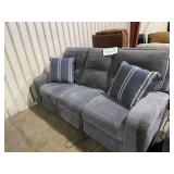Sofa with power reclining ends
