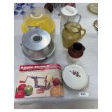 Apple-Mate 1 apple corer and slicer, angel food cake pan, plastic cake container, Pamperws Chef pitcher, yellow glass pitcher, 4 snack plates, milk jar