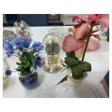 2 floral arrangements, clock