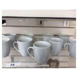 Unmarked set of 9 white coffee mugs