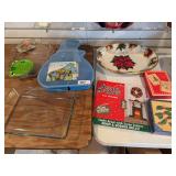 Plastic snowman, glass baking dish, plastic poinsettias tray, Christmas cards