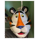 Tony the Tiger cookie jar and pig cookie jar