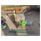 Bulb planter, weed liner, potting soil, hose reel box, sump pump drainage kit