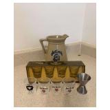 Jack Daniel’s pottery pitcher , set of 4 Jack Daniel’s shot glasses ,3 Jim Beam shot glasses and 2 miscellaneous shot glasses