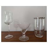 Lot of stemmed glasses, silver trim glasses, 2 Chianti wine bottles (1 with broken stopper)