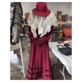 Women’s antique dress with lace shawl and mannequin
