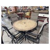 Stone top patio table and 4 swivel chairs