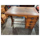 Antique wooden desk with iron hardware
