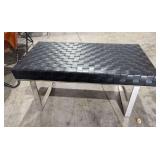 Woven black bench with chrome base