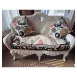 Three piece wicker set: two love seats (54') and chair