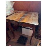 Antique wooden side table with carving