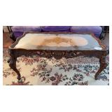 Carved wood coffee table with protective glass 38' x 17' x 20'