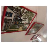 4 red framed pictures going down wall to basement on left side all signed by H. Hargrove