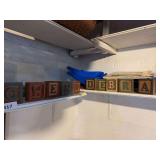 Wooden blocks, shovels, vintage detergent boxes