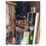 Contents of corner of garage, including yard tools, yard chemicals, miscellaneous