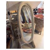 Wicker swinging mirror