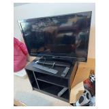 Seiki 38" television with remote & stand 28" x 20" x 20"