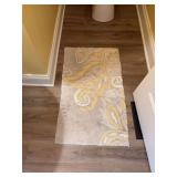 Bathroom rug and wall decor