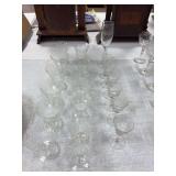 7 etched glasses 4.5x3.5, 6 etched glasses that match the 7 that are 3.5x3, and 6 etched stemmed cordials that don’t match others , and a 2000 champagne flute