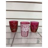 3 votive holders and a trinket box