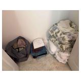 Items in lower closet, bedding, air mattress, child’s bed rail, jeans