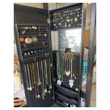 Jewelry armoire with mirror & necklaces, bracelets, rings, earrings