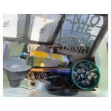 Tub of misc items: desk lamp, 4x6 picture frame,  jar of bottle caps,  fountain hose