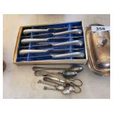 Silverplate knives, butter dish, collector spoons
