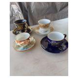 Four China cup and saucers
