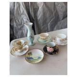 4 cups and saucers, vase, saucers