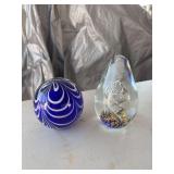 Two large paper weights