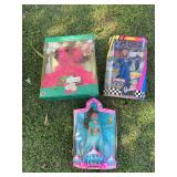 3 in box Barbies: I dream of Jeannie has been opened: 50th anniversary NASCAR:1990 Happy Holidays Barbie