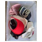2 tubs with hats & visors, fanny packs electric juicing cup, wallet, gloves, router