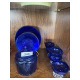 Blue plates, blue/clear sherbets, blue cracker jar