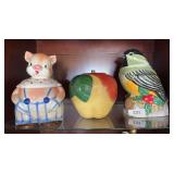 Vintage pig (Styled by Lorraine Elam) & Apple (cracked) cookie jars, modern bird cookie jar
