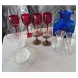 Clear glass basket, plates and 4-cordials, red stemware, blue vase, 2 amber village glasses