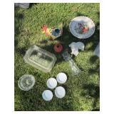 Tub of glass and ceramic items
