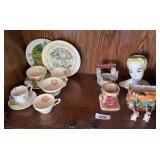 Vintage head vase, planters, dear salt & pepper shakers, tea cups, saucers, 2 collector plates