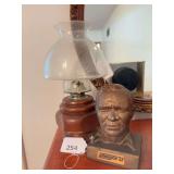 Wood oil lamp, bust