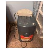 Crosscut paper shredder and a surge protector