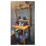 Wooden shelf with hooks