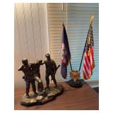 Korean War Memorial of Evansville, IN figure, patriotic desktop dual-flag set featuring an American flag alongside a Veterans of Foreign Wars flag mounted on a round base with a central insignia emble