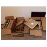 3 boxes in of picture frames