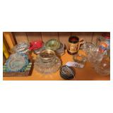 Lots of old ashtrays , cups