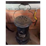 Vintage  cylindrical kerosene or oil space heater,