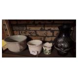 antique white ceramic or ironstone chamber pot with a side handle, 2 small planters and 1 vintage black amethyst glass vase featuring a hand-painted silver floral motif,