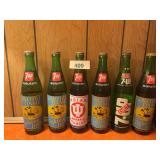 7 Old 7up bottles